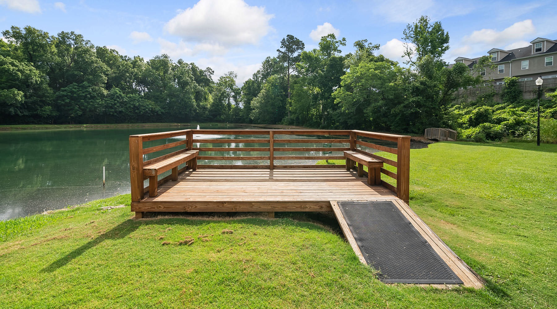 platform with benches next to pond